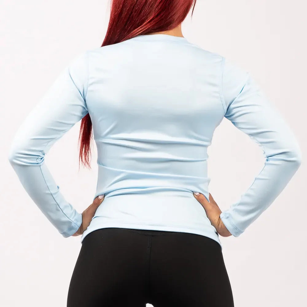 BUZO COMPRESION MUJER - AZUL CELESTE