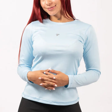 BUZO COMPRESION MUJER - AZUL CELESTE
