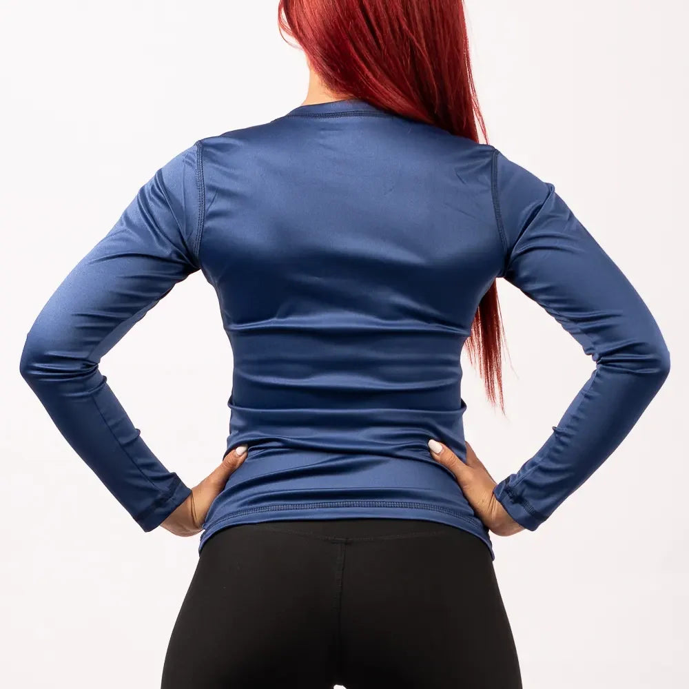 BUZO COMPRESION MUJER - AZUL TURQUI