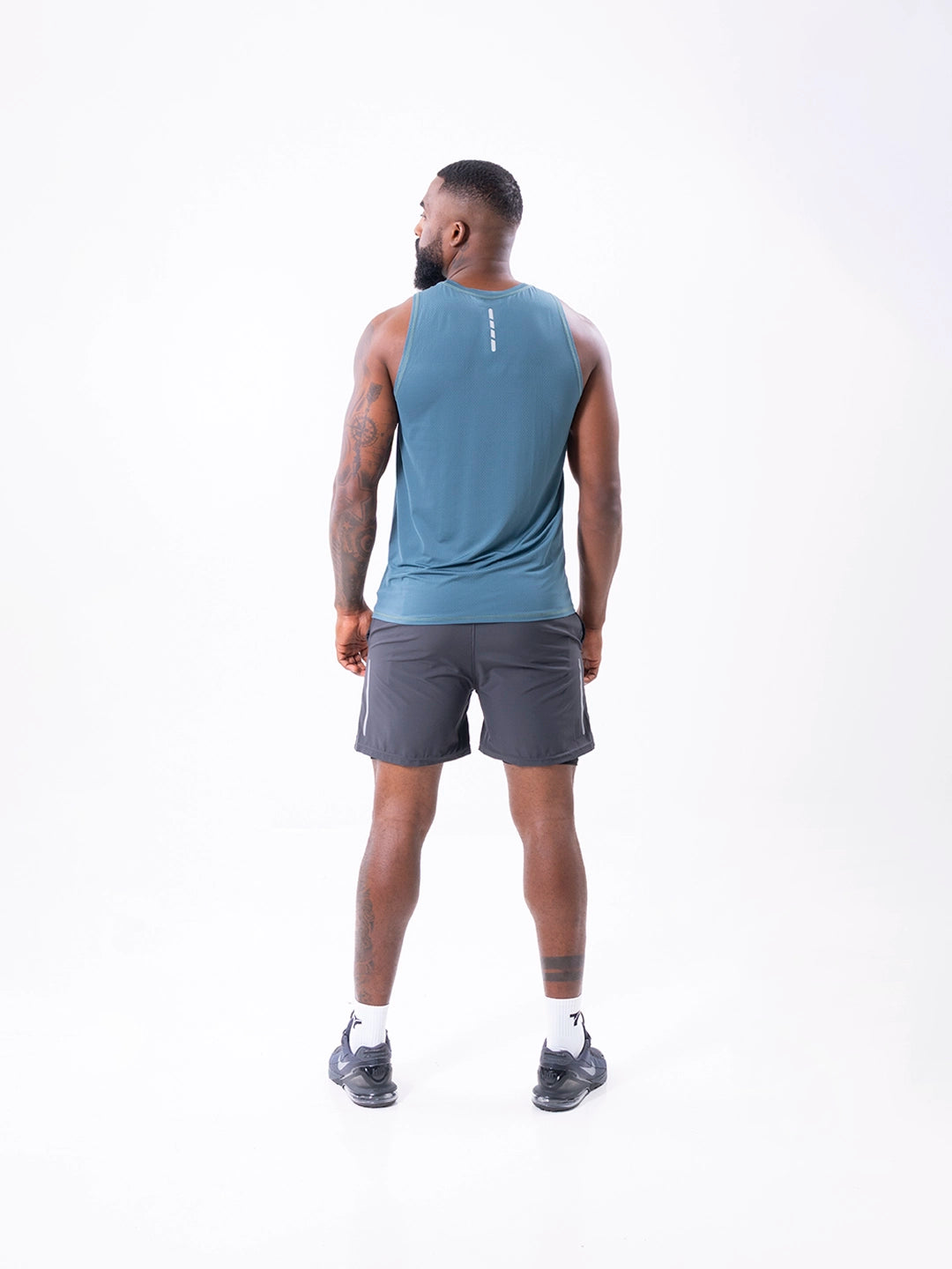 CAMISILLA RUNNING HOMBRE - VERDE ESMERALDA
